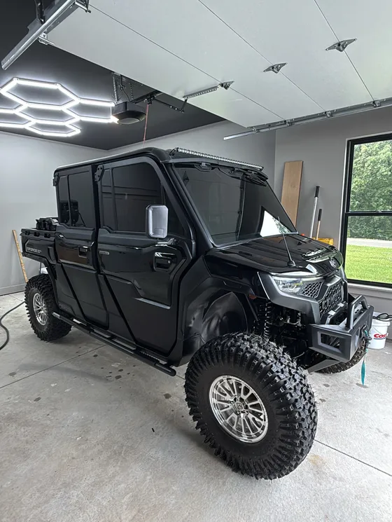 Blacked out side by side detailed in a workshop